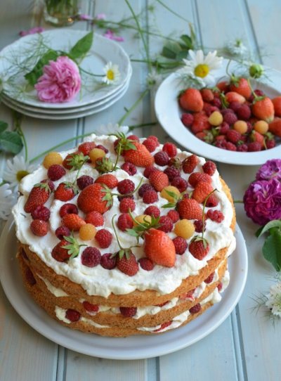 /swedish-midsummer-cake-with-berries-and-cream-lavender-and-lovage.jpg