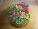 Min syster fick en korg med blommor. flower_basket_cake.jpg