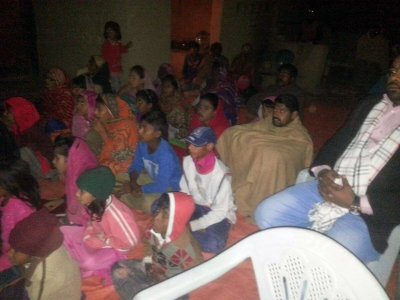 People in Pakistan waching the movie about Jesus Christ in the streets and in small villages